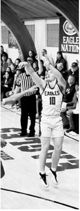 #10 Colton Bailly puts up a 3-pointer. Photo By Ashley Schafer