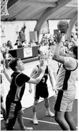 #44 Junior Cameron Saldana goes up for two points. Photo by Ashley Schafer