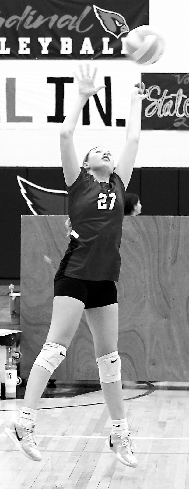 Ramsey Lindseth returns the ball over the net in the Cards’ win against the Raiders in Langdon. Photo by Larry Stokke.