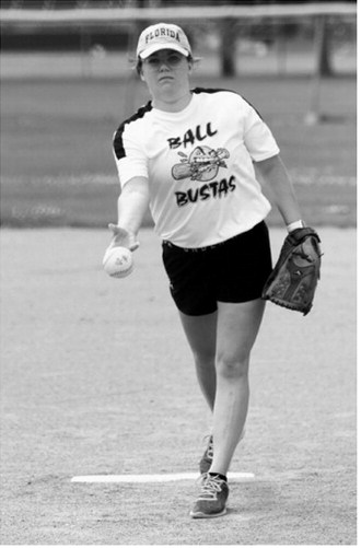 Brynn Williams delivers a pitch during the co-ed softball tournament. Photo by Larry Stokke