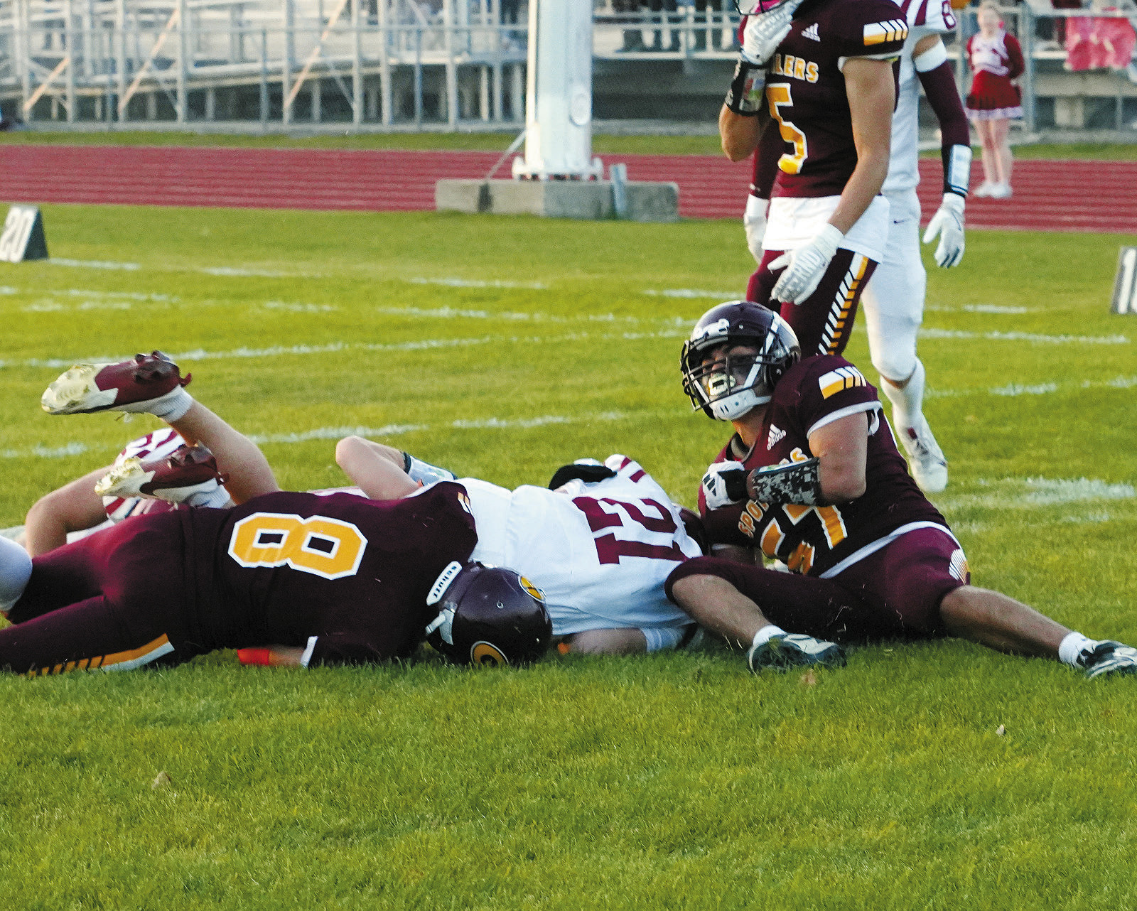 Eastyn Schaefer scores for the Cards on a 2-yard run with an extra point kick from Sam Davis. Photo by Larry Stokke.