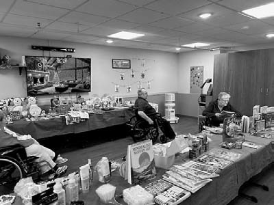 The ‘gift shop’ that’s set up each year to offer residents Shoppers browse at PNC’s gift shop. an opportunity to shop for their friends and families.