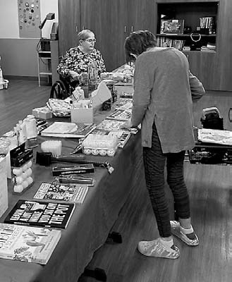 Lorraine and Rose browsing through the shop at PNC.