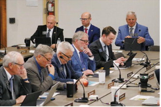 Lawmakers on the Joint Appropriations Committee study legislation during a January special session convened to budget the first two years of the state's Rural Health Transformation Program funding. Photo by Mary Steurer/North Dakota Monitor