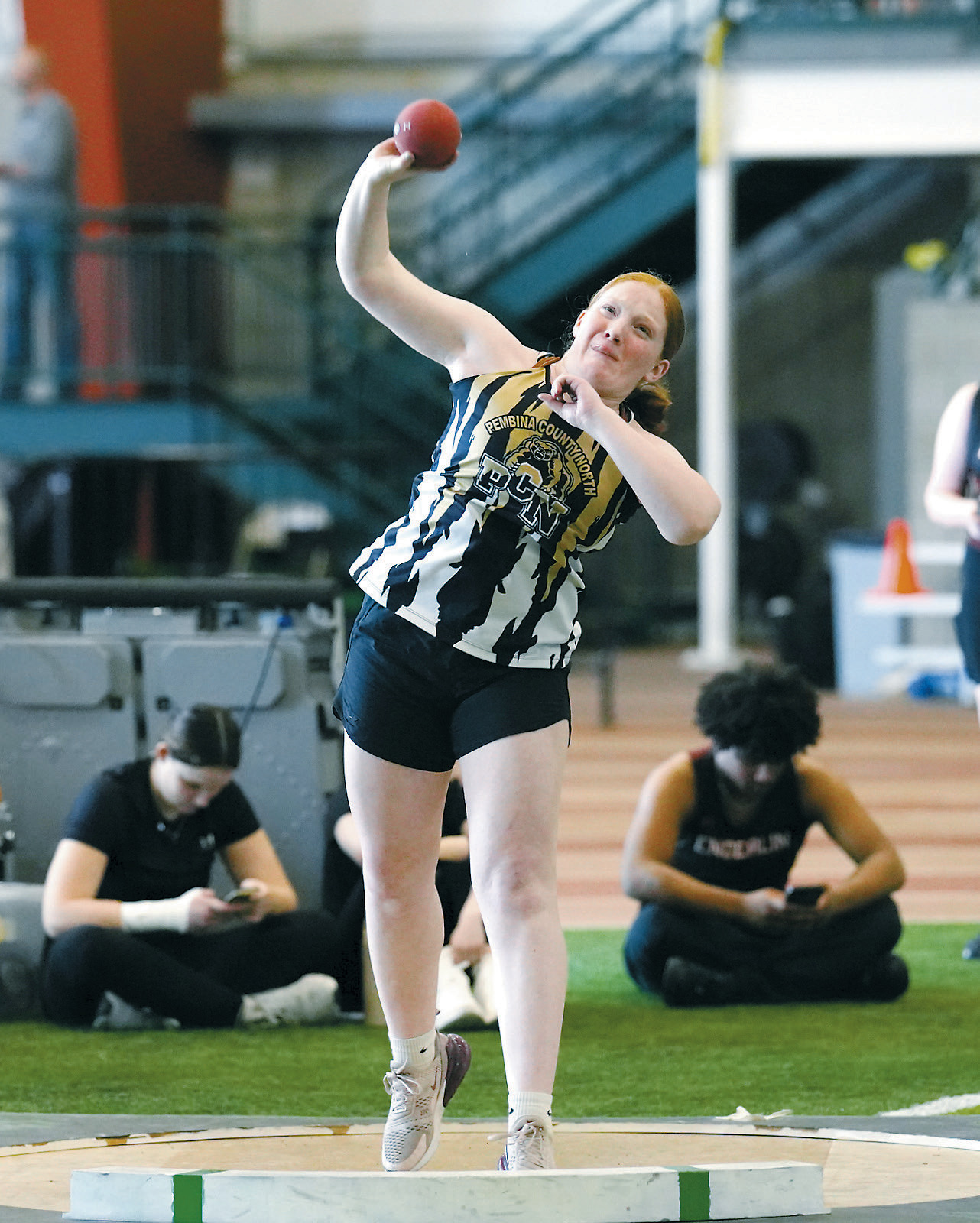 PCN’s Amelia Carpenter had a throw of 25’ 10”. Photo by Larry Stokke