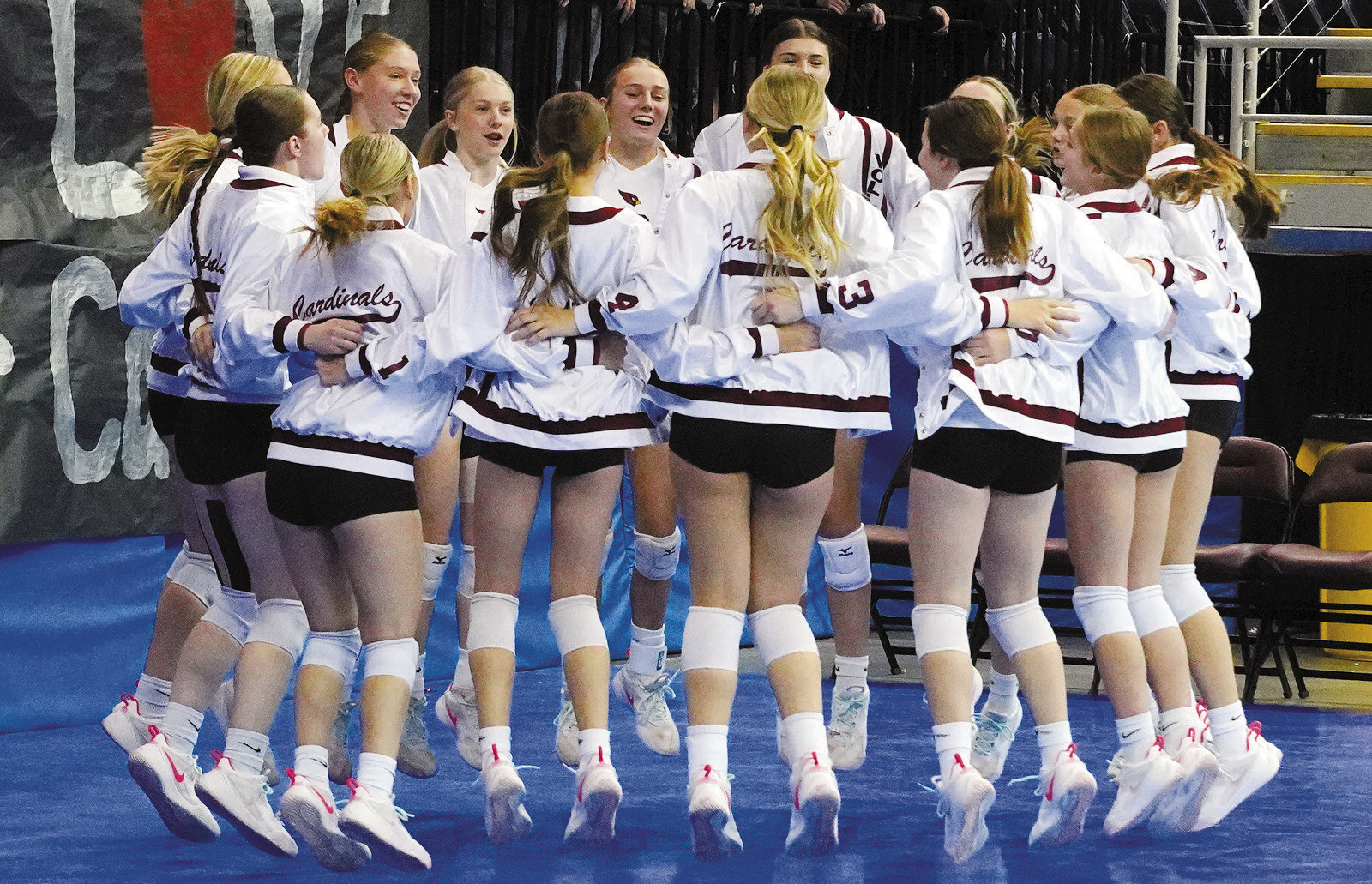The Cardinals celebrating their Class B State win! Photo by Larry Stokke.