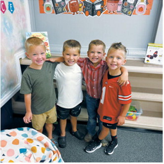 From left, Huxley Overby, Parker Flink, Olin Bjornstad and Vince Howatt pose together on the first day of pre-K at St. Alphonsus School. Submitted photo
