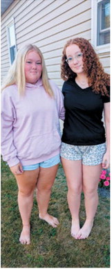 Brianna Wild, a 10th-grader, left, and Jenna Wild, an eighth-grader, are ready for the first day of school. Photo courtesy of Carol Potter Wild