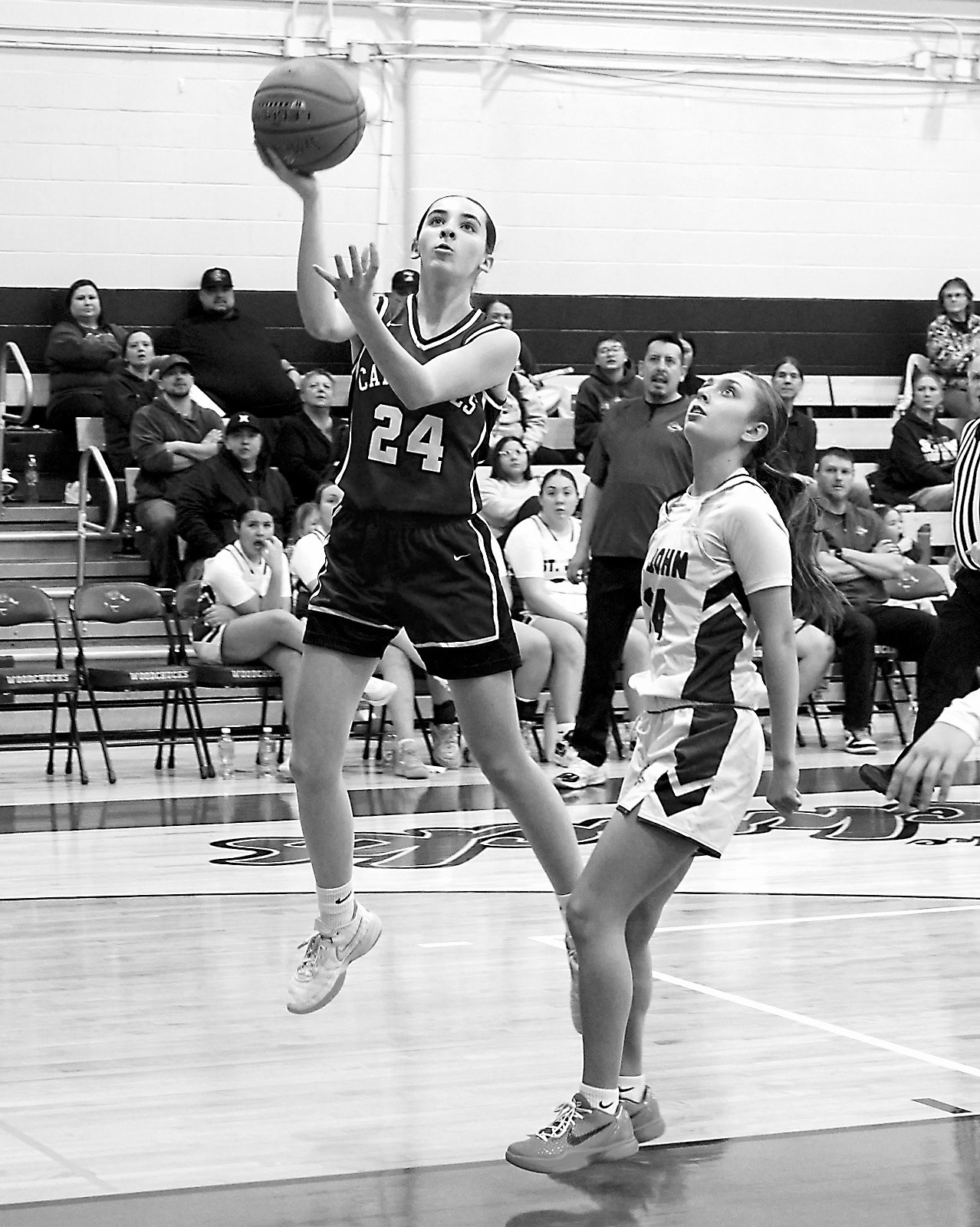 Avery Lorenz was Player of the Game in the Lady Cards' win over the ST John Woodchucks with an 18-point game. Photo by Larry Stokke.