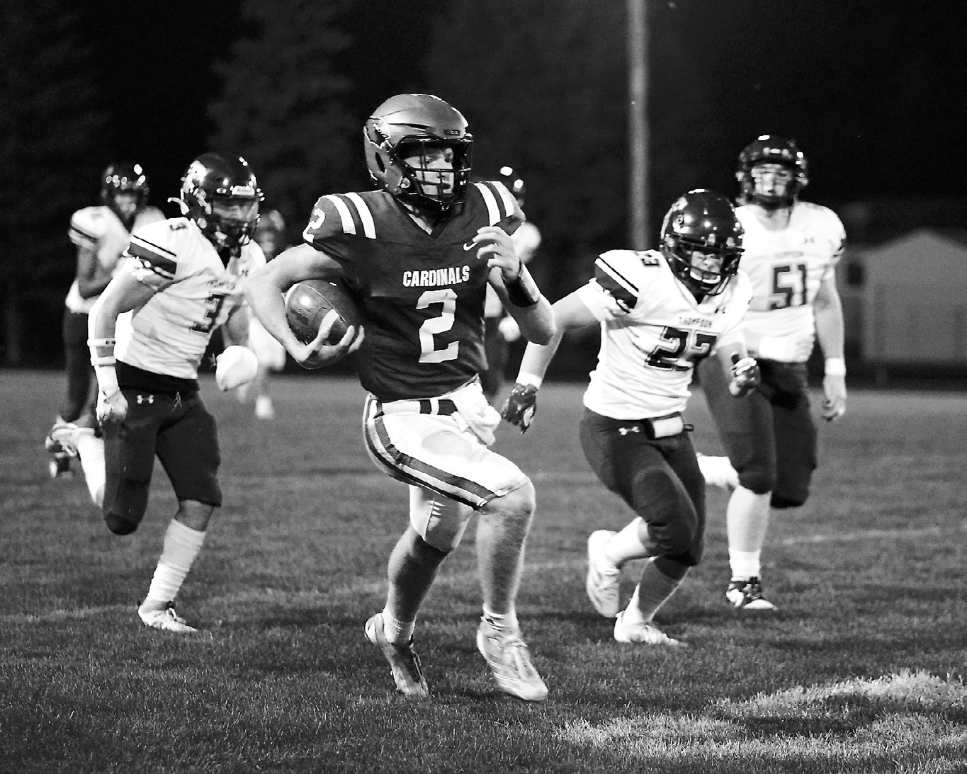 Player of the Game Jax Johnson rushed for 111 yards and had two touchdowns in the Cards' win over Thompson. Photo by Larry Stokke.
