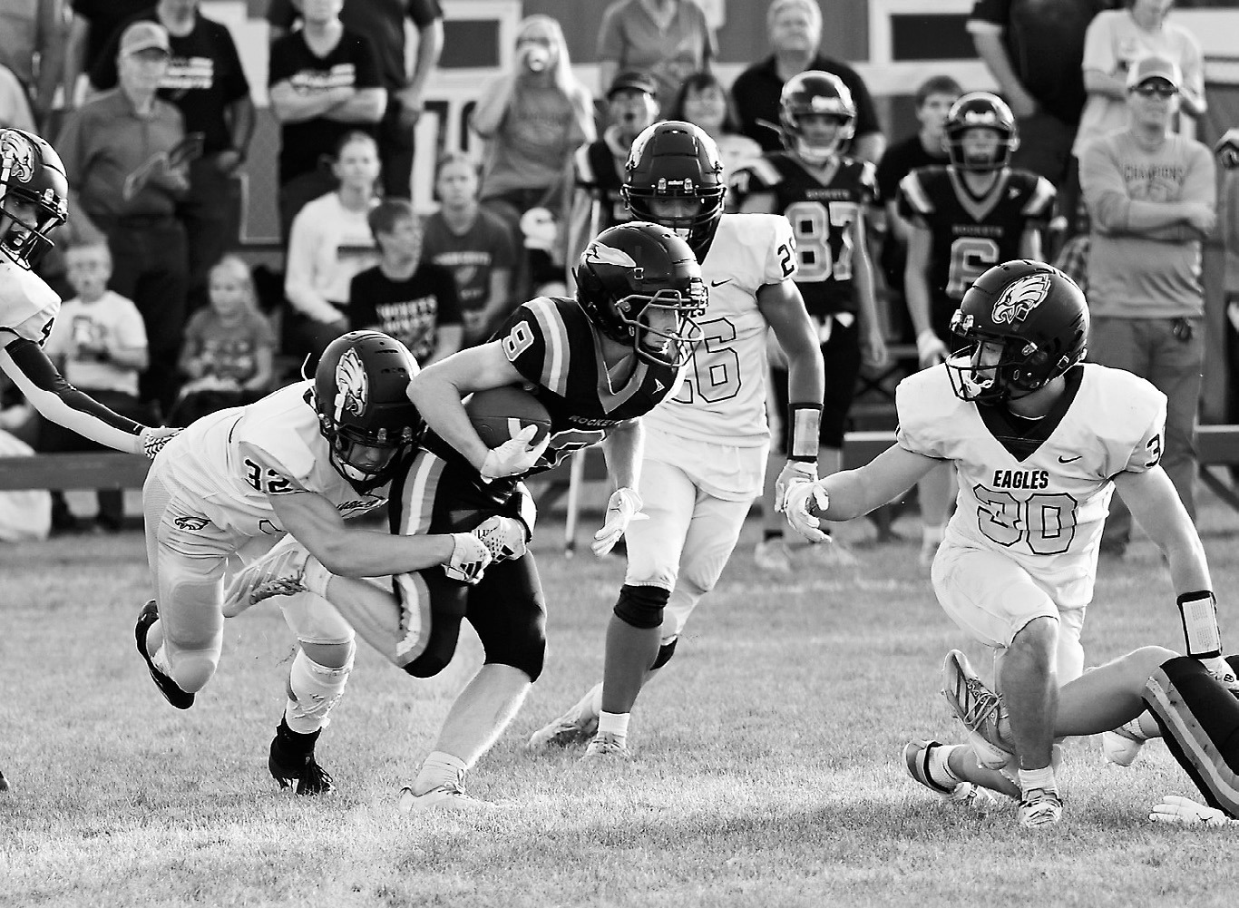 Jerik Johnson closes in and finishes the play with a tackle. Photo by Ashley Schafer.