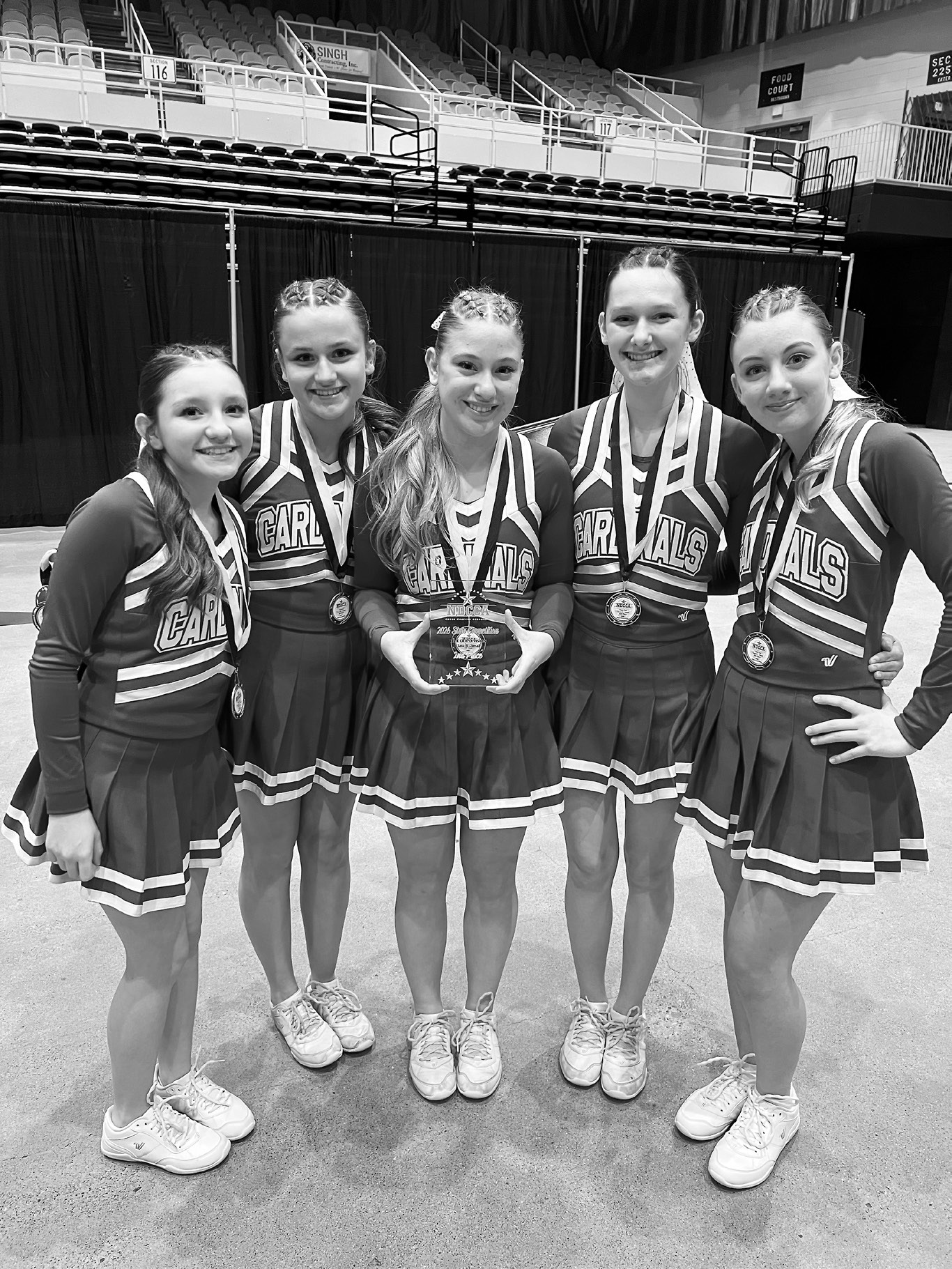 From left: Destiny Aguilar, Ruby Davis, Maci Hoffarth, Eliot Olson and Nora van Heerden of the Langdon Area High School cheer team at the state competition in Bismarck. Submitted photo