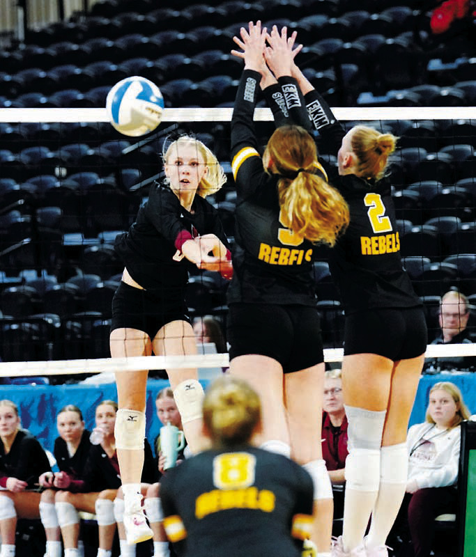 Hilary Haaven had a great game leading the Lady Cards in kills and digs at state. Photo by Larry Stokke.