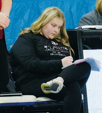 Haaven Radway, the Cards' statistician, kept busy each game and was a valuable asset to the team and coaches all season. Photo by Larry Stokke.