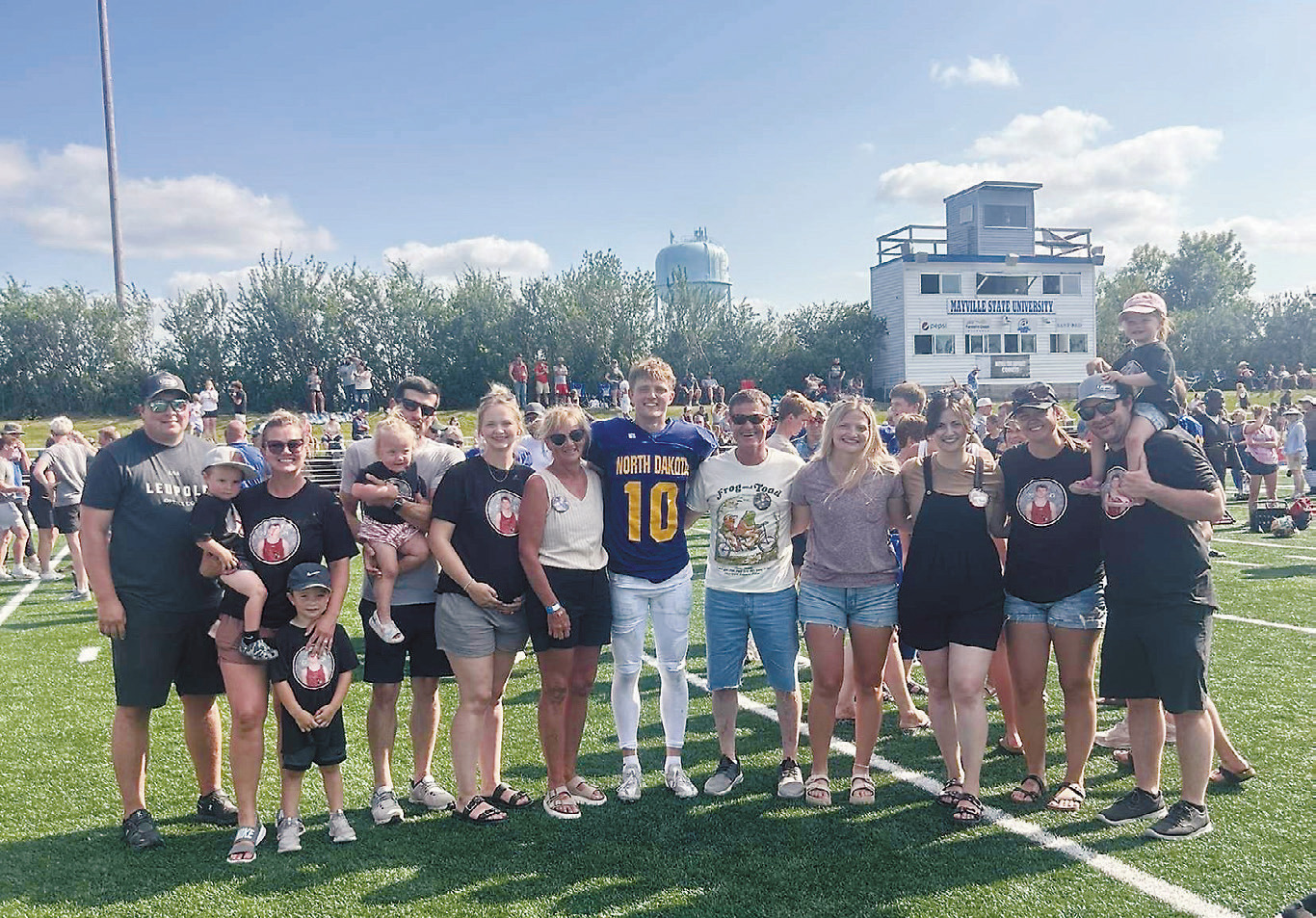 Langdon-Munich senior Cody Amble with his huge family cheering section, led by parents Marty and Sheri Amble of Sarles. What a great crew!