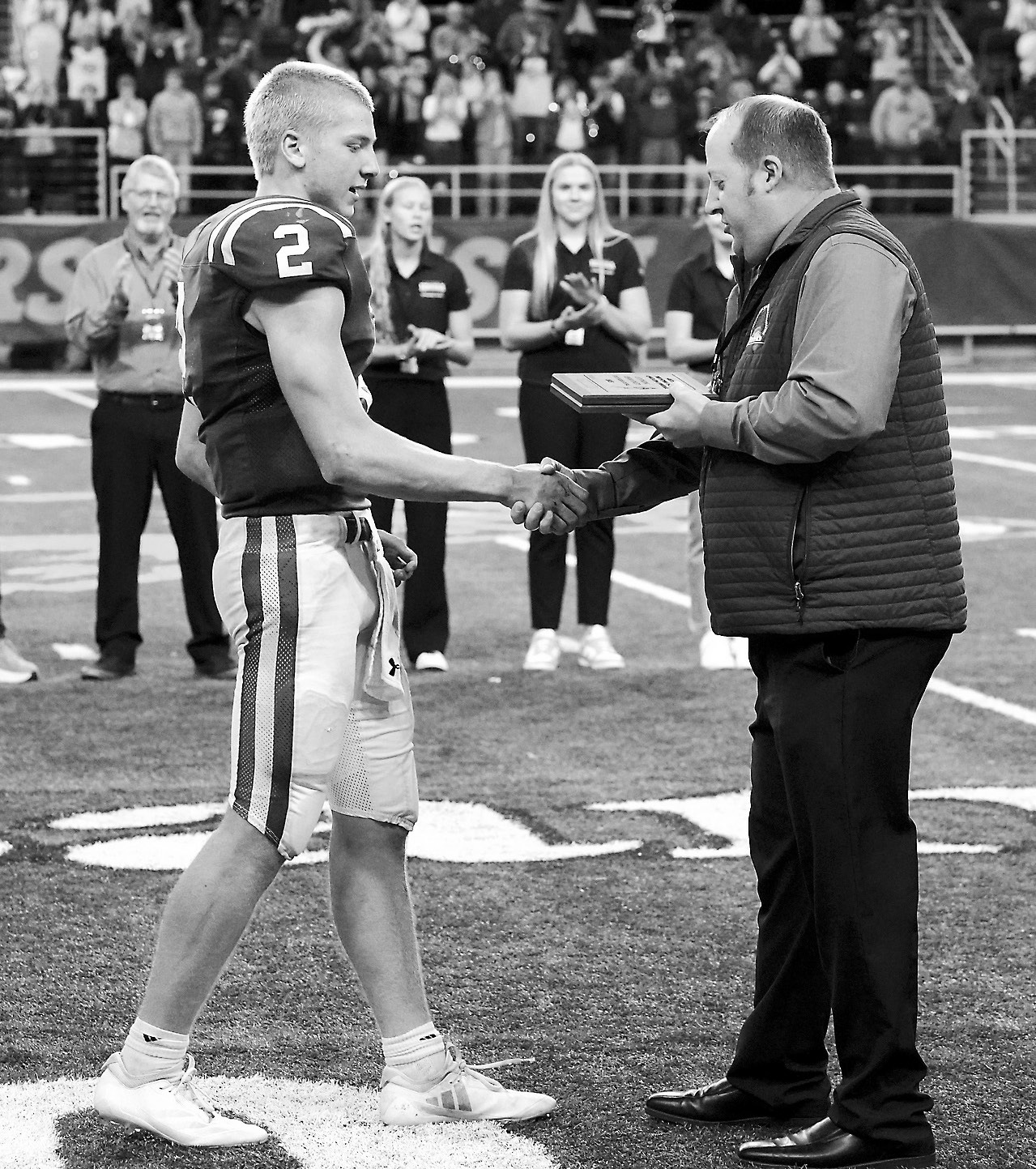 Jax Johnson accepting his Senior Athlete of the Year award. Photo by Larry Stokke.