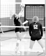 Langdon Area-Munich setter Kemi Morstad sets the ball during a scrimmage Saturday, Aug. 22, in Thompson. Photo by Larry Stokke