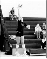 Langdon Area-Munich’s Taya Feist delivers a jump serve during a scrimmage Saturday, Aug. 22, in Thompson. Photo by Larry Stokke