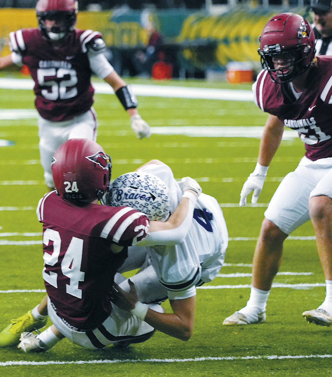 Evan Ottem tackles the Bottineau quarterback. Photo by Larry Stokke.