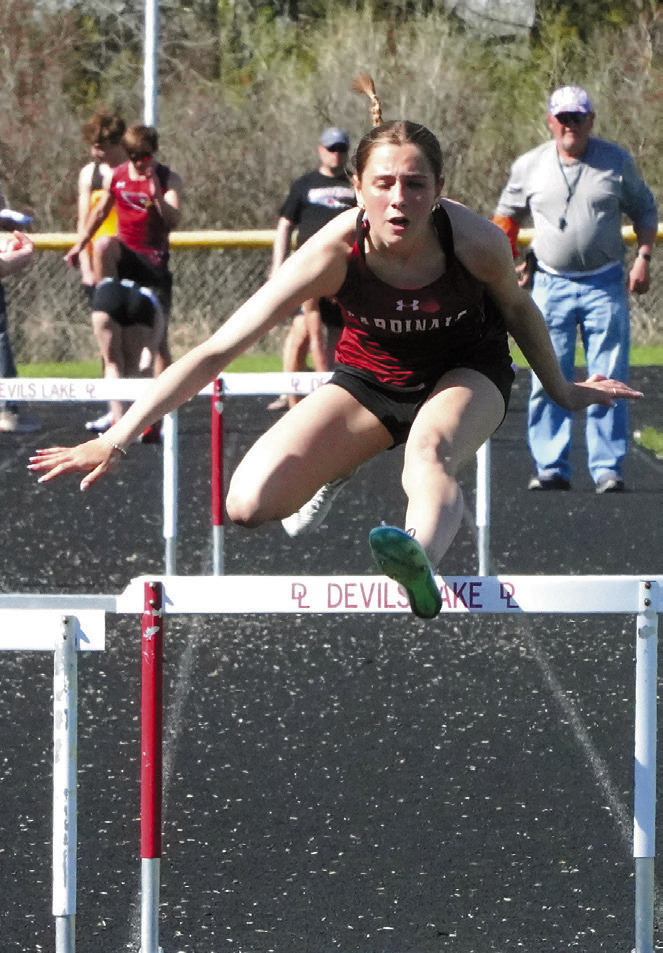 Meggy Hetletved placed 4th in the 100 meter hurdles in Devils Lake on April 1. Photo by Larry Stokke.