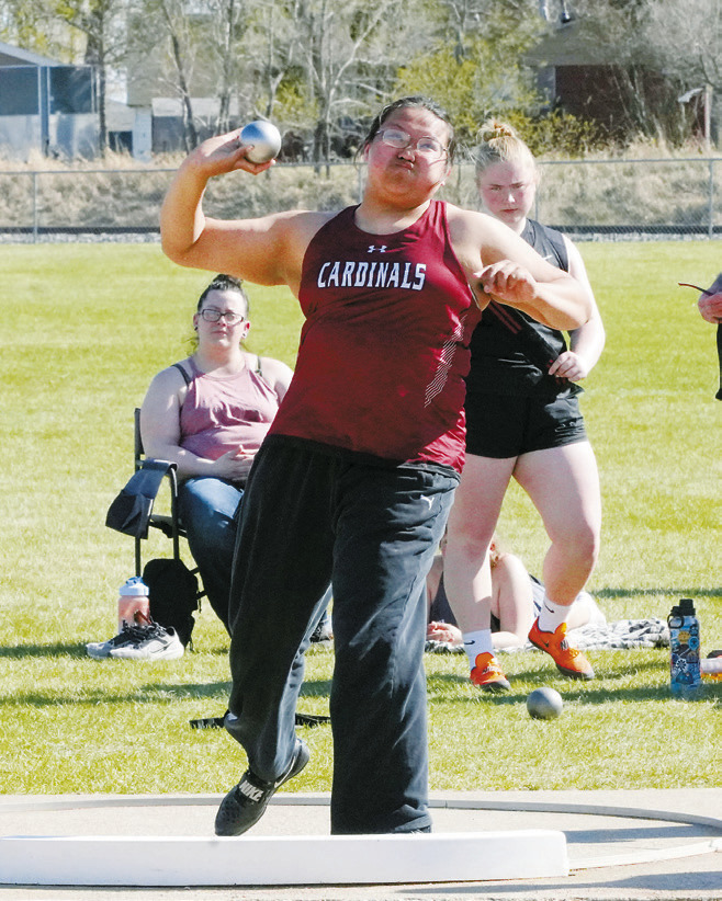 Christine Joyner threw the shot put 34' 4' giving her a 2nd place finish in the meet at Devils Lake on April 5. Photo by Larry Stokke.