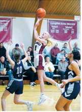 Rolla in Munich Jan. 23. Photo by Larry Stokke Mya Swanson drives past four North Prairie defenders and drops in a lay up. Photo by Larry Stokke