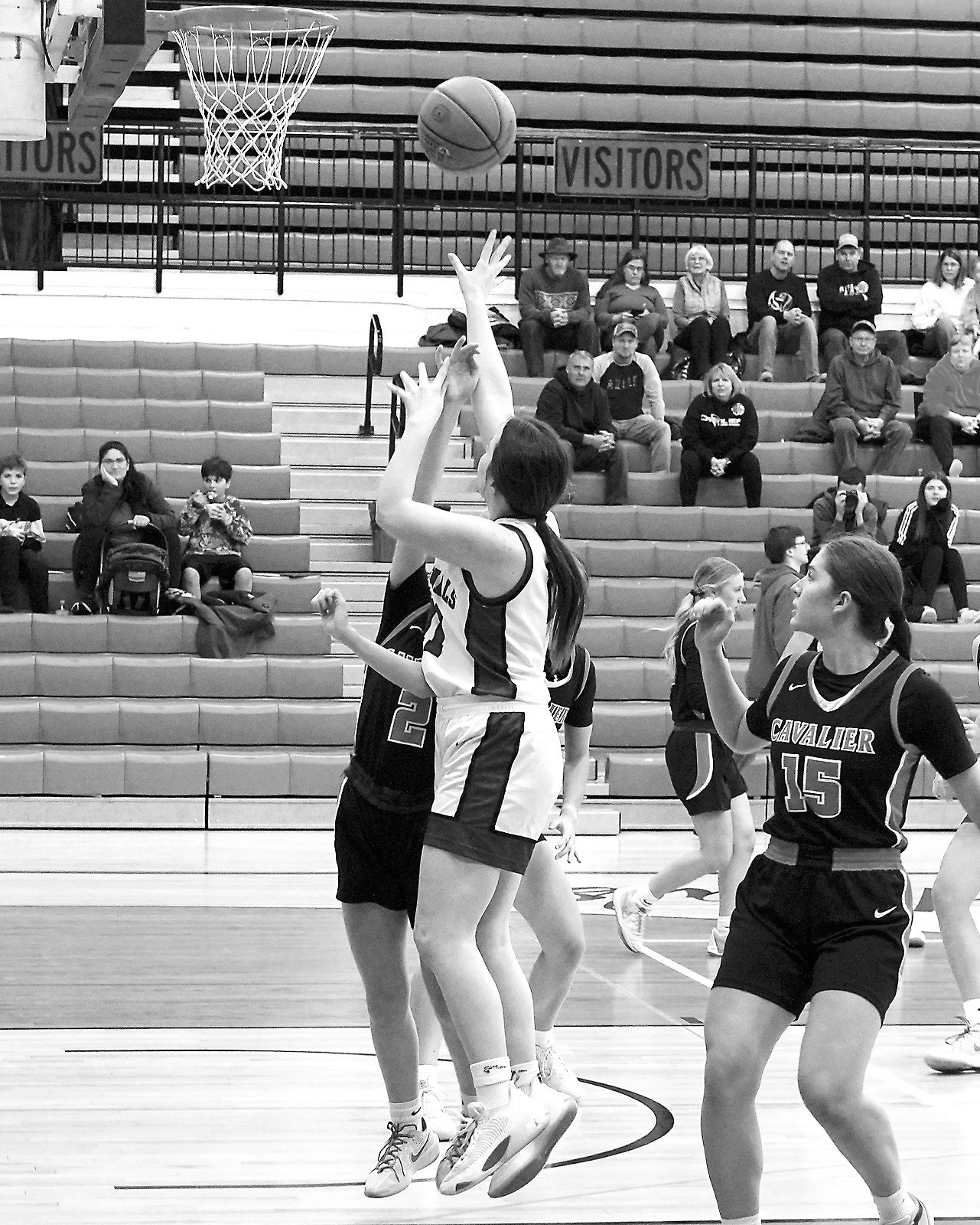 Player of the Game Erika Bakke went two for two from the free throw line and finished with a 12-point night in the Cards' win over the Tornadoes. Photo by Larry Stokke.