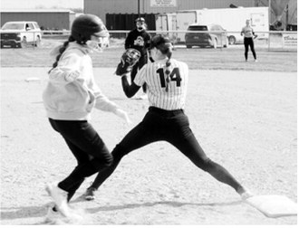 Jocelyn Anderson makes a catch for an out against the Cardinals during action in Cavalier on May 11. Photo by Larry Stokke