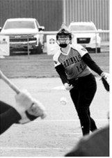 Nadia Lewis delivers a pitch during the Cardinals’ game against the Grizzlies. Lewis finished the game with four strikeouts and four walks. Photo by Larry Stokke