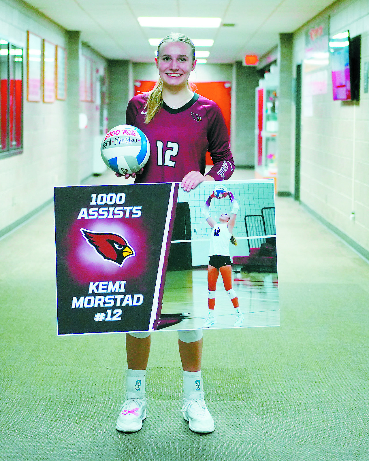 Congratulations goes out to Kemi Morstad for getting her 1000th assist in her volleyball career. Photo by Larry Stokke.