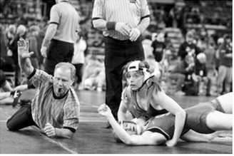 Marlie Stremick made short work of her opponent in the 136 pound weight class and finished the 2-day tournament with a 4th place finish. Photo by Larry Stokke.