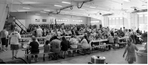 Community members fill the Langdon Fire Hall during the Langdon Fire Department's 43rd annual Fireman's Social and Fundraiser on July 17. The annual event featured a roast beef and pork supper and serves as one of the department's largest fundraisers of the year. Photo by Larry Stokke