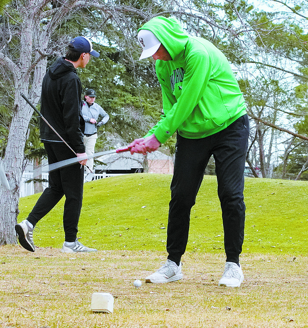 Reese Hoffarth tees off in the Nelson County meet on April 22 in McVille. Photo by Larry Stokke.