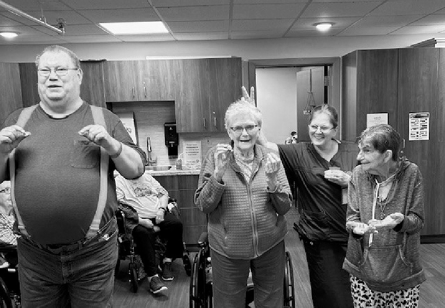 Richard, Georgie, Rose, and Camille with their winning medals.