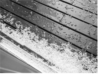 Hail piled up along decks, driveways and low-lying areas as a series of storms moved across the Borderland on June 2. While some communities reported accumulations of hail, others received brief but heavy rainfall as the storms passed through the region. Photo submitted.