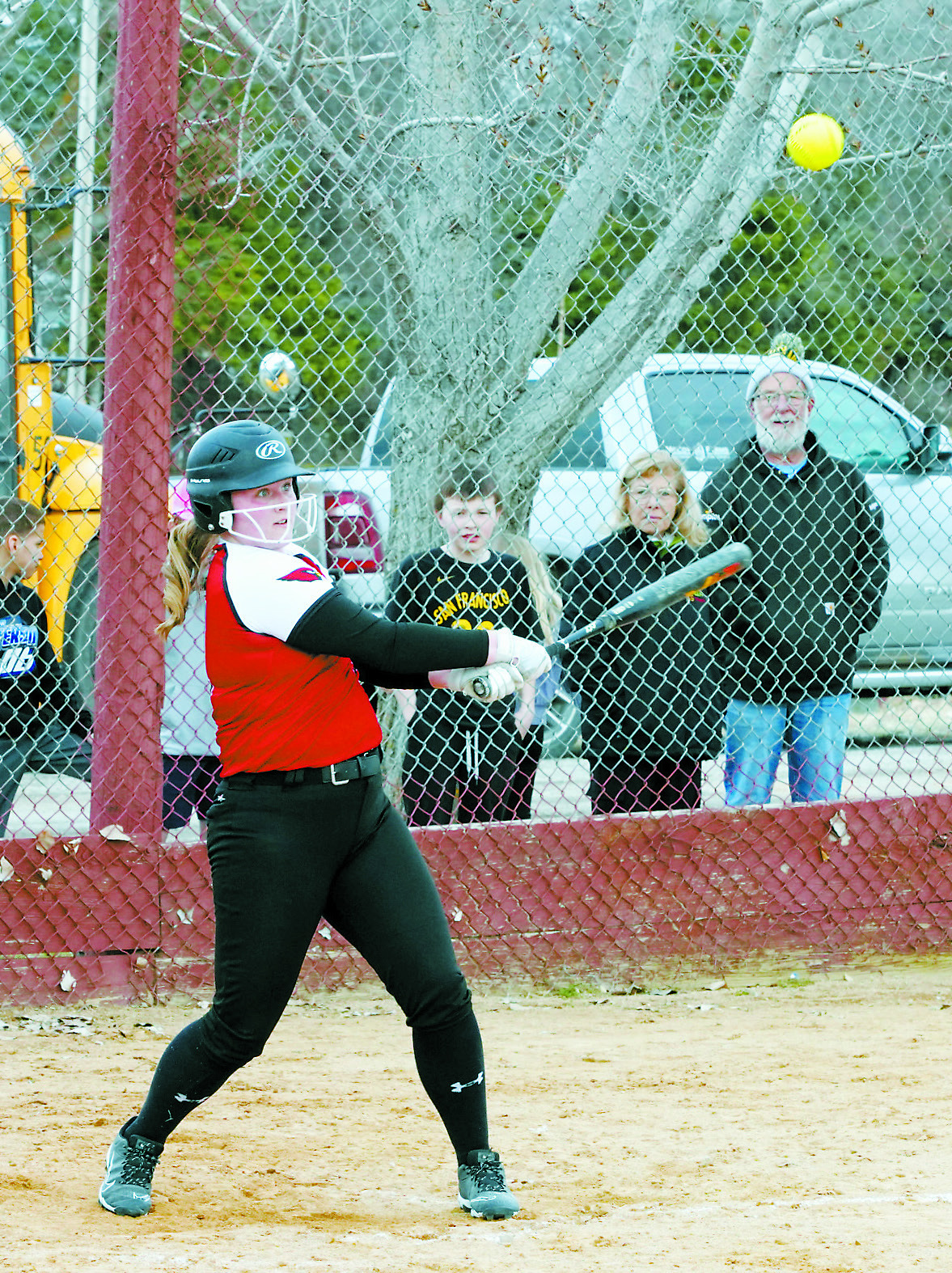 Izzy Vikan connects for a base hit against Larimore in Langdon on April 24. She had four hits on the day. Photo by Larry Stokke.