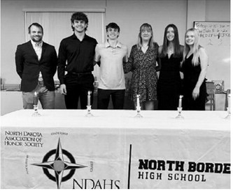 Pictured, from left, are Mr. Huber (faculty adviser), Bryce Carignan, Kaden Moore, Gracyn Hornung, Jaelyn Johnson and Jaci Fraser during the North Border High School National Honor Society induction ceremony. Submitted photo