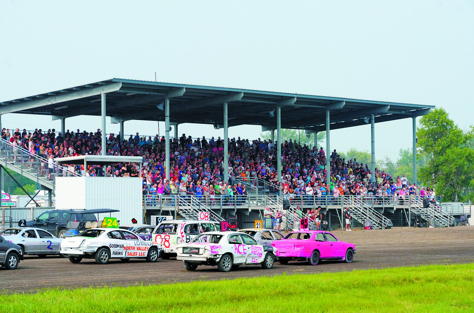 The stands were packed for the Bush Car and Redneck Pickup racing. Photo by Larry Stokke.
