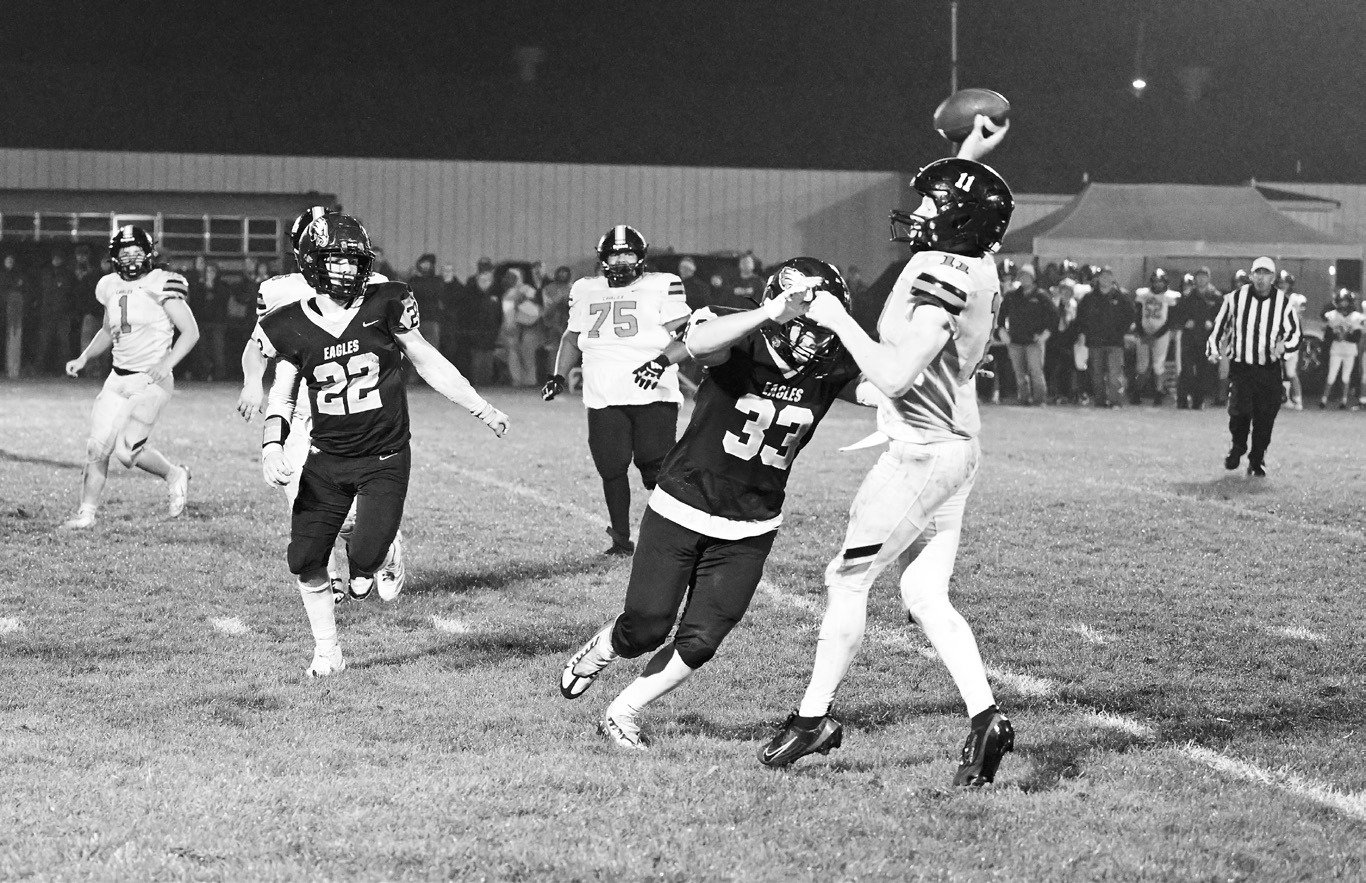 Kade Schafer putting the pressure on Jack Gunderson. Photo by Ashley Schafer.