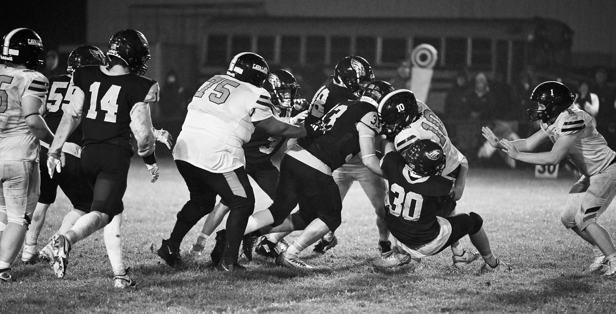 Brody Berg, Kade Schafer, and Garret Willits put a stop to the Tornadoes’ advance. Photo by Ashley Schafer.