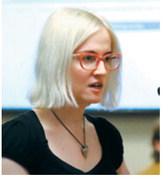 Faye Seidler, a suicide prevention advocate, testifies March 24, 2025, during a legislative committee hearing. Seidler is recruiting volunteers for a new LGBTQ+ Safety Taskforce. Photo by Mary Steurer/North Dakota Monitor