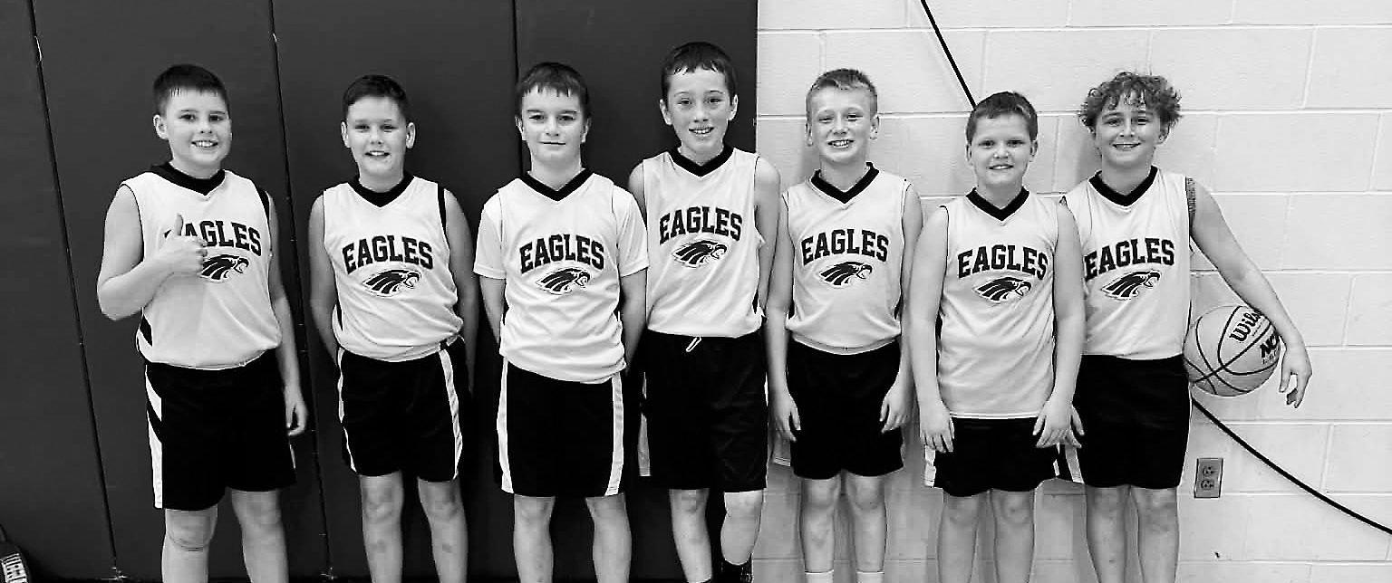 L-R: Blake Rollness, Jace Rollness, Jett Rollness, Griffin Moe, Cohen Trupe, Nixon Tryan and Hudson Ehlers. Coach Jason Tryan. Submitted photo