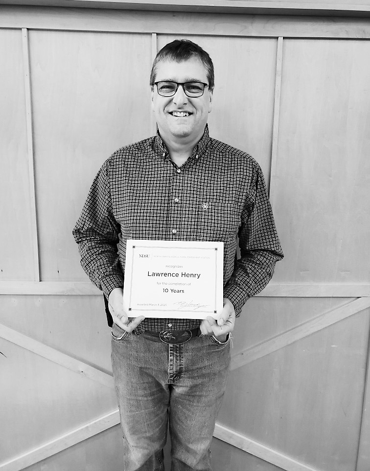 Lawrence Henry, Langdon REC Research Specialist II, was honored last week for his 10 years of service to the organization.