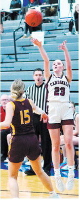 Hallie Overby drops in a 3-point basket against Linton HMB. Photo by Larry Stokke