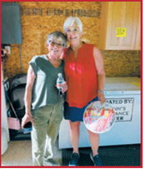Concession volunteers Karen Kempert and Cindy Moser catch a moment for a photo. Submitted photo