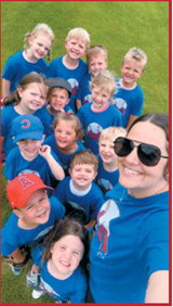 Coach Bata poses with her T-Ball Cubs team during the 2026 youth baseball season. The young players enjoyed a summer of learning fundamentals, teamwork and having fun on the ball field. Submitted photo