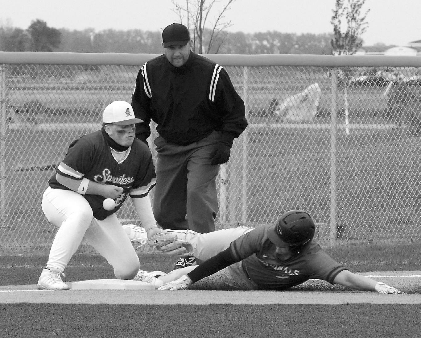 Theo Romfo gets on base against Grafton on May 19. Photo by Larry Stokke.
