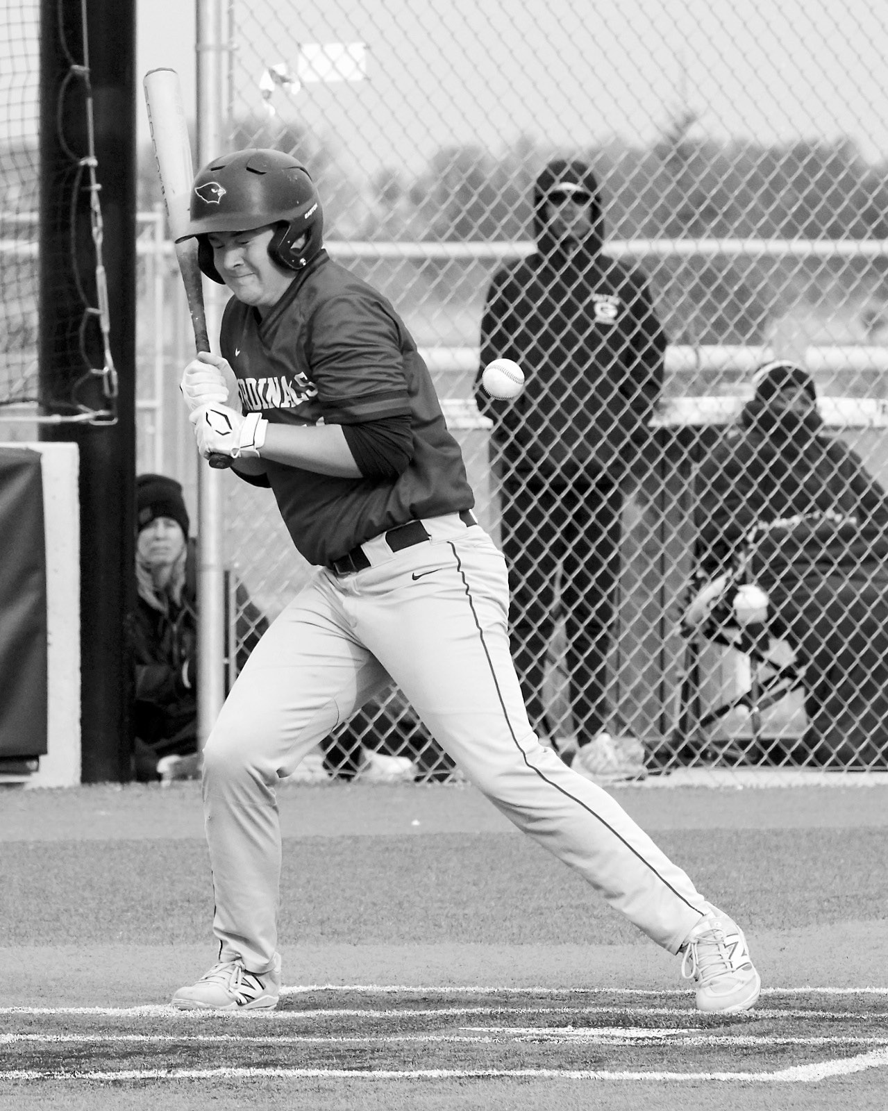 Devin Hakanson gets on base after getting hit by a pitch in Park River against the Spoilers. Photo by Larry Stokke.