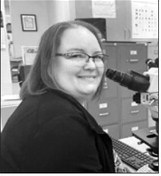 Bekki Holzkamm, lab manager at West River Health Services in rural North Dakota, has been trying to hire a technician since late summer. But not one U.S. citizen has applied. West River will have to pay a new $100,000 H-1B visa fee — or request an exemption — if it wants to hire one of its foreign applicants. (Kathrine Abelita).