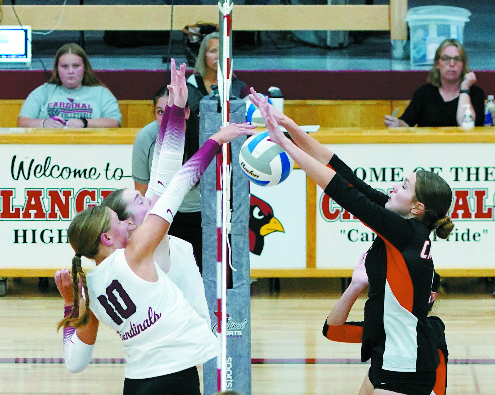 Aubrey Badding with a kill against Cavalier. Photo by Larry Stokke.